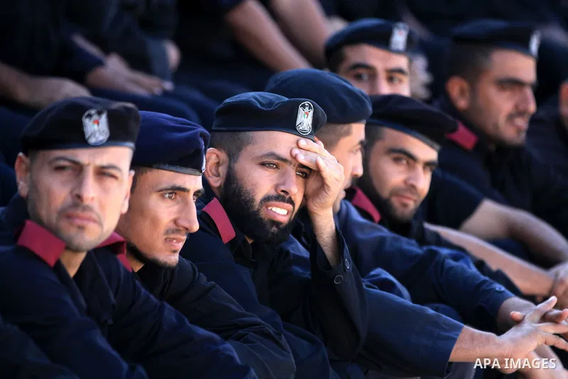 Palestinian police men take part in a graduation ceremony for members of Hamas security forces in Gaza City December 17, 2012. Photo by Majdi Fathi