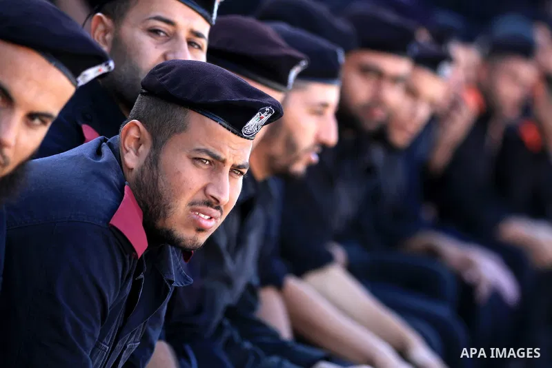 Palestinian police men take part in a graduation ceremony for members of Hamas security forces in Gaza City December 17, 2012. Photo by Majdi Fathi