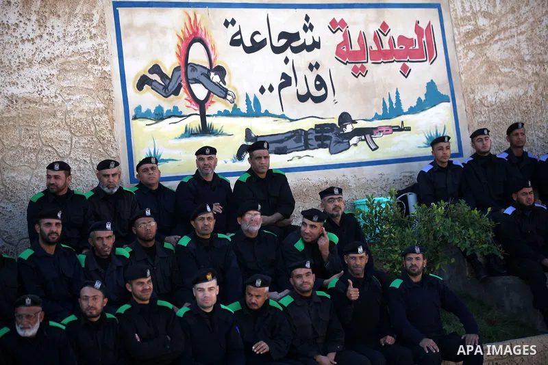 Palestinian police men take part in a graduation ceremony for members of Hamas security forces in Gaza City December 17, 2012. Photo by Majdi Fathi
