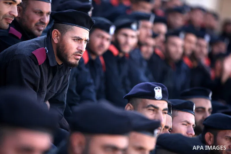 Palestinian police men take part in a graduation ceremony for members of Hamas security forces in Gaza City December 17, 2012. Photo by Majdi Fathi