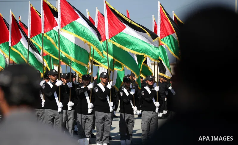 Members of Hamas' Palestinian National Security stand during a graduation ceremony for members of Hamas security forces in Gaza City December 17, 2012. Photo by Majdi Fathi