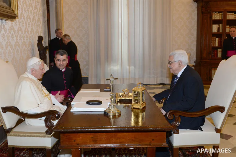 Palestinian President Mahmud Abbas meets with Pope Benedict XVI during a private audience in the library of the Apostolic Palace at the Vatican on December 17, 2012 . Photo by Thaer Ganaim
