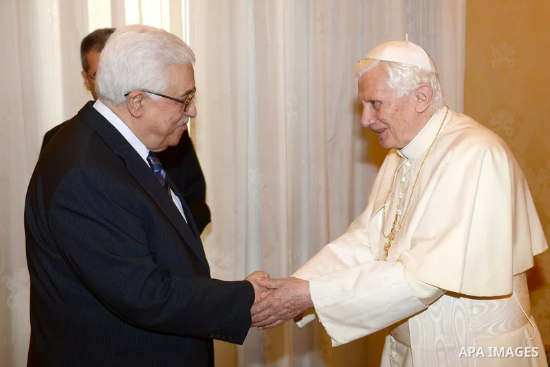 Palestinian President Mahmud Abbas meets with Pope Benedict XVI during a private audience in the library of the Apostolic Palace at the Vatican on December 17, 2012 . Photo by Thaer Ganaim