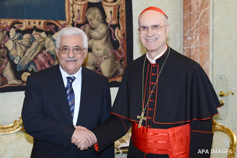Palestinian President Mahmoud Abbas meets with Vatican Secretary of State Cardinal Tarcisio Bertone during an official visit to Vatican on 17 December 2012. Photo by Thaer Ganaim