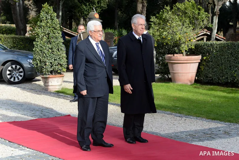 Palestinian President Mahmoud Abbas meets with Italian Prime Minister Mario Monti during an official visit to Italy on 17 December 2012. Photo by Thaer Ganaim