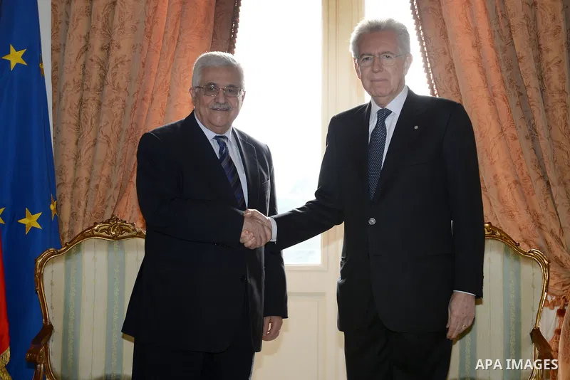 Palestinian President Mahmoud Abbas meets with Italian Prime Minister Mario Monti during an official visit to Italy on 17 December 2012. Photo by Thaer Ganaim