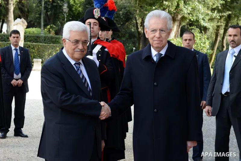 Palestinian President Mahmoud Abbas meets with Italian Prime Minister Mario Monti during an official visit to Italy on 17 December 2012. Photo by Thaer Ganaim