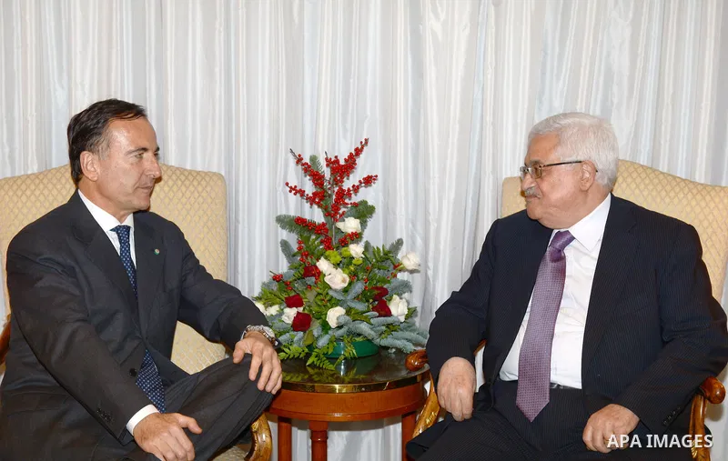 Palestinian President Mahmoud Abbas meets with former Foreign Minister of Italy during an official visit to Rome on 17 December 2012. Photo by Thaer Ganaim