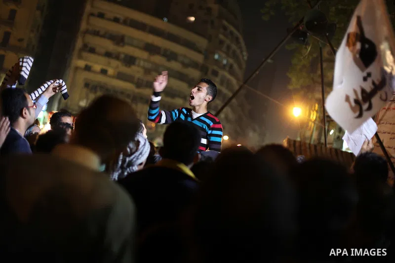 Protesters opposing Egypt's President Mohamed Mursi shout slogans as they demonstrate in front of the presidential palace in Cairo December 18, 2012. Opponents of Mursi staged protests in Cairo on Tuesday against an Isla...