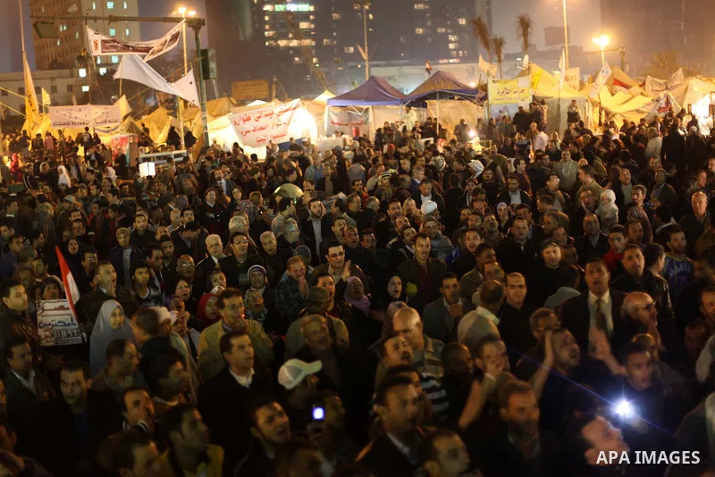 Protesters opposing Egypt's President Mohamed Mursi shout slogans as they demonstrate in front of the presidential palace in Cairo December 18, 2012. Opponents of Mursi staged protests in Cairo on Tuesday against an Isla...