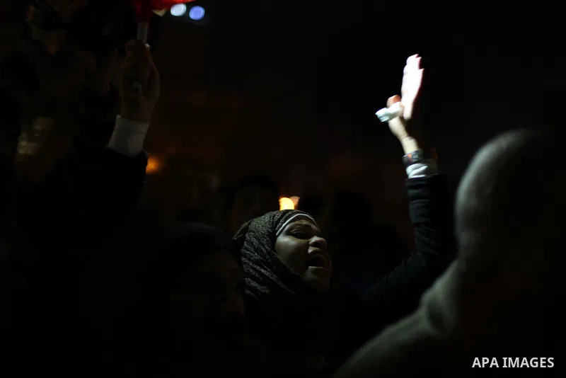 Protesters opposing Egypt's President Mohamed Mursi shout slogans as they demonstrate in front of the presidential palace in Cairo December 18, 2012. Opponents of Mursi staged protests in Cairo on Tuesday against an Isla...
