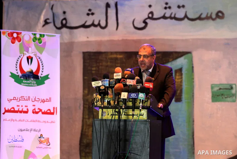 Palestinian Minister of Health in Gaza strip Mofeed al-mokhalalati speaks during a ceremony to honor medics and doctors who work during the eight days of Israeli air strikes on Gaza strip in Gaza city on 19 December 2012...