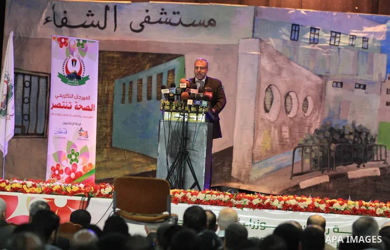 Palestinian Minister of Health in Gaza strip Mofeed al-mokhalalati speaks during a ceremony to honor medics and doctors who work during the eight days of Israeli air strikes on Gaza strip in Gaza city on 19 December 2012...