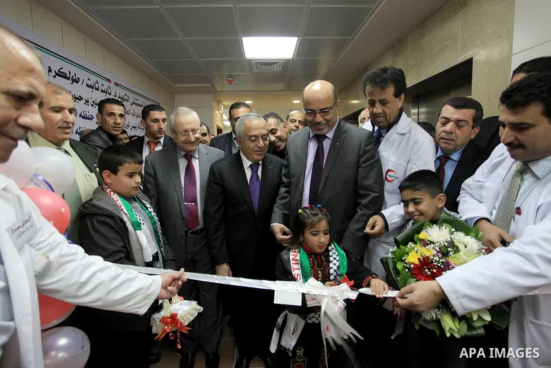 Palestinian Prime Minister Salam Fayyad attends the opining of department of Obstetrics in Thabet hospital in the West Bank city of Tulkarm on 19 December 2012. Photo by Mustafa Abu Dayeh