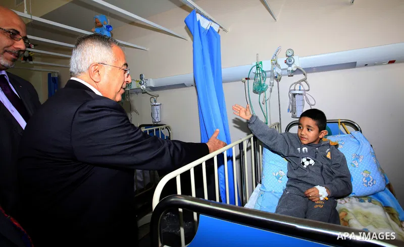 Palestinian Prime Minister Salam Fayyad attends the opining of department of Obstetrics in Thabet hospital in the West Bank city of Tulkarm on 19 December 2012. Photo by Mustafa Abu Dayeh