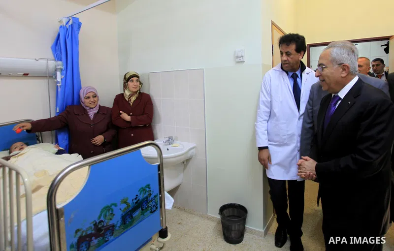 Palestinian Prime Minister Salam Fayyad attends the opining of department of Obstetrics in Thabet hospital in the West Bank city of Tulkarm on 19 December 2012. Photo by Mustafa Abu Dayeh