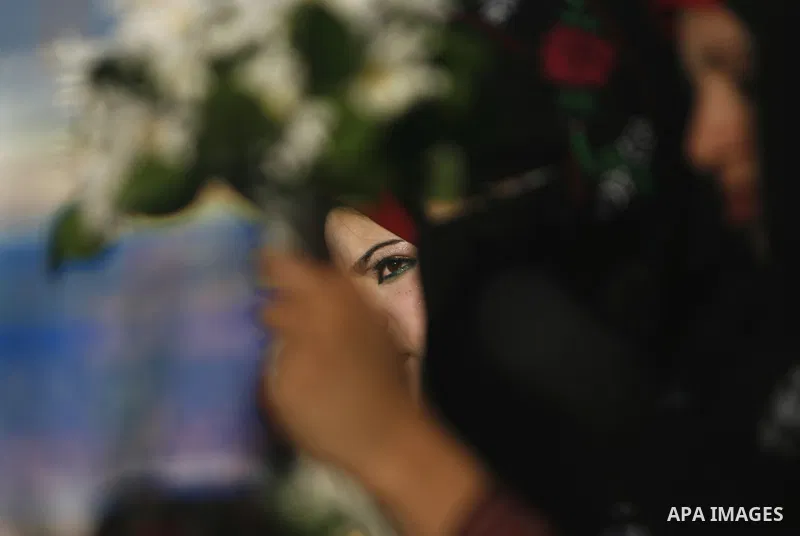 Palestinian brides pose during a mass wedding ceremony in Rafah southern Gaza strip, on December 19, 2012. The mass wedding organized by National Islamic Committee and funding by the institution of Sheikh Khalifa bin Zay...