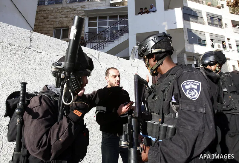 Israeli soldiers detain a Palestinian youth during clashes with Palestinians in the Arab Jerusalem neighbourhood of Issawiya after a demonstration in solidarity with Palestinian prisoner Samer Issawi, held in an Israeli...