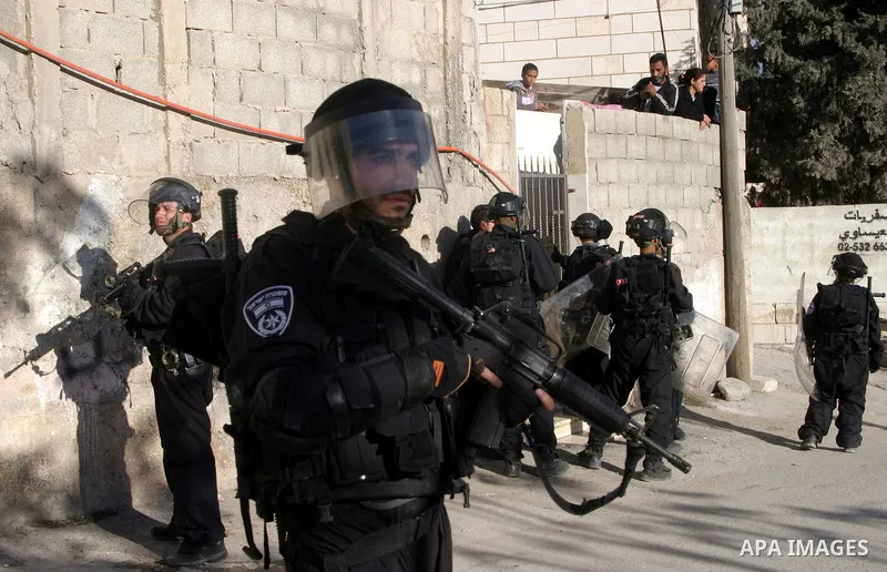 Israeli soldiers stand guard during clashes with Palestinians in the Arab Jerusalem neighbourhood of Issawiya after a demonstration in solidarity with Palestinian prisoner Samer Issawi, held in an Israeli jail and on hun...