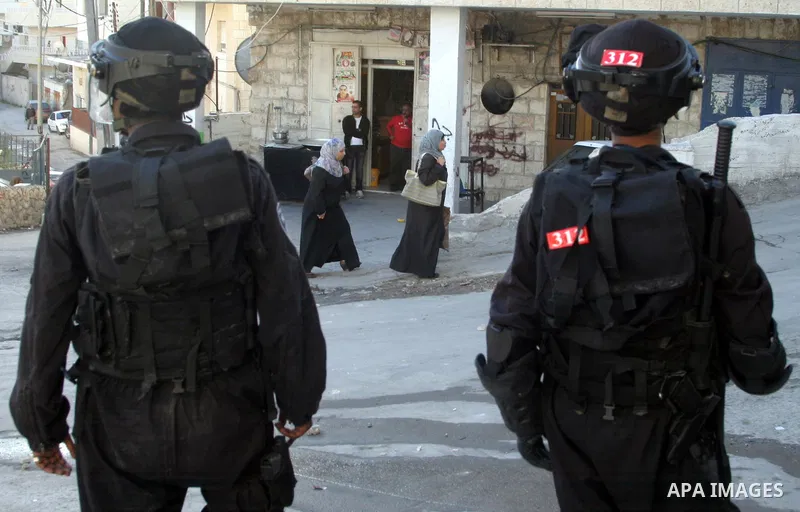 Israeli soldiers stand guard during clashes with Palestinians in the Arab Jerusalem neighbourhood of Issawiya after a demonstration in solidarity with Palestinian prisoner Samer Issawi, held in an Israeli jail and on hun...