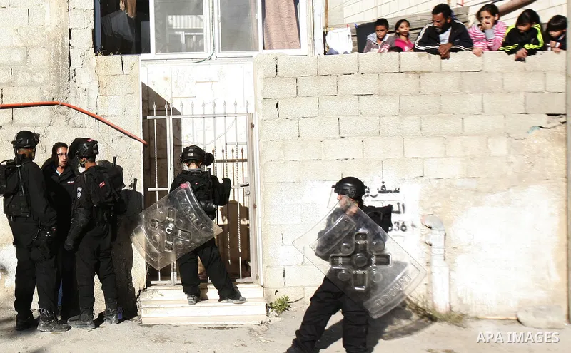 Israeli soldiers detain a Palestinian youth during clashes with Palestinians in the Arab Jerusalem neighbourhood of Issawiya after a demonstration in solidarity with Palestinian prisoner Samer Issawi, held in an Israeli...