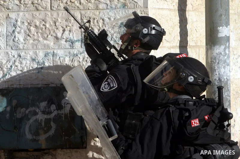 Israeli soldiers stand guard during clashes with Palestinians in the Arab Jerusalem neighbourhood of Issawiya after a demonstration in solidarity with Palestinian prisoner Samer Issawi, held in an Israeli jail and on hun...