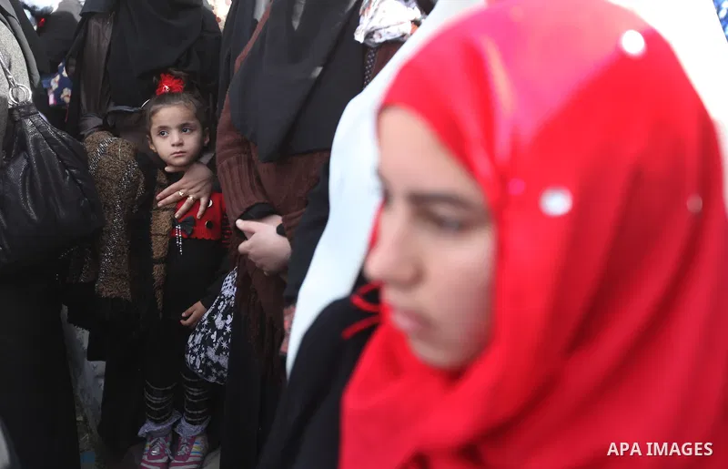 Palestinian women chant slogans during a protest calling for stop against women violence by Israeli forces in Gaza City, on Dec. 20, 2012. Photo by Majdi Fathi