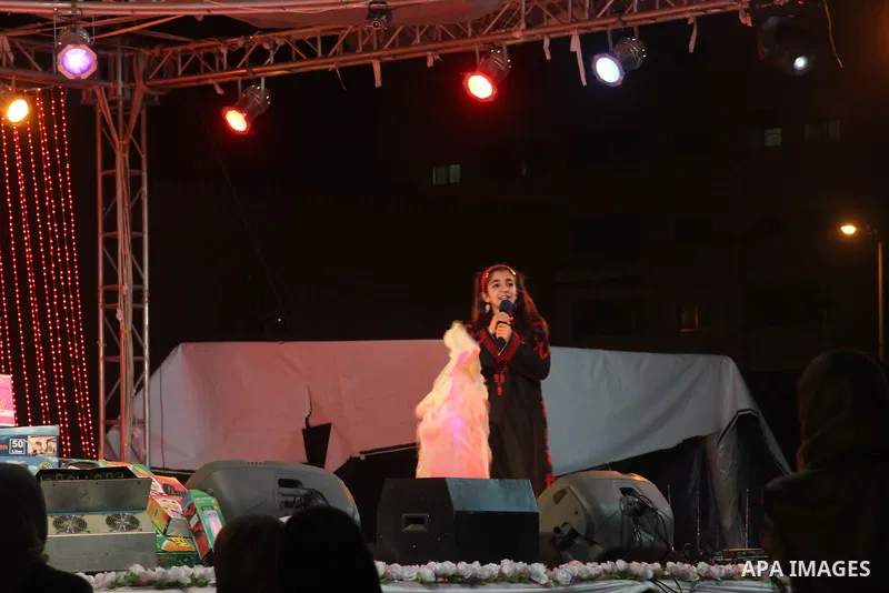 Members of the Birds of Paradise team sing during an Islamic song festival in Gaza City on December 20, 2012. Photo by Ezz Zanoun
