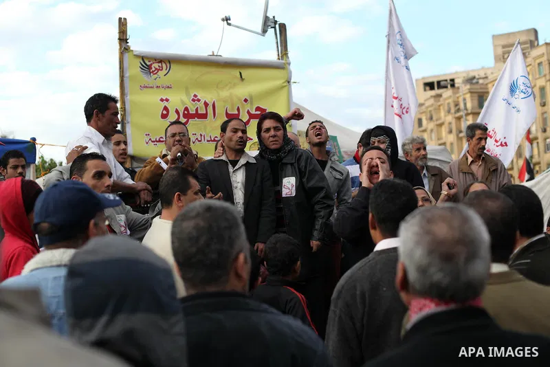 Egyptian protesters gather for a demonstration at Tahrir square in Cairo, Egypt, Friday, Dec. 21, 2012. Running clashes between rival protesters erupted in Egypt's second city Alexandria, on the eve of the final round of...