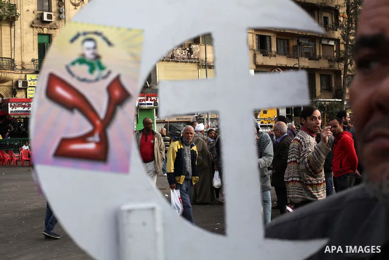 Egyptian protesters gather for a demonstration at Tahrir square in Cairo, Egypt, Friday, Dec. 21, 2012. Running clashes between rival protesters erupted in Egypt's second city Alexandria, on the eve of the final round of...