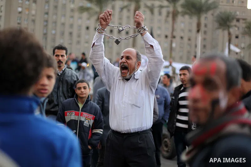 Egyptian protesters gather for a demonstration at Tahrir square in Cairo, Egypt, Friday, Dec. 21, 2012. Running clashes between rival protesters erupted in Egypt's second city Alexandria, on the eve of the final round of...