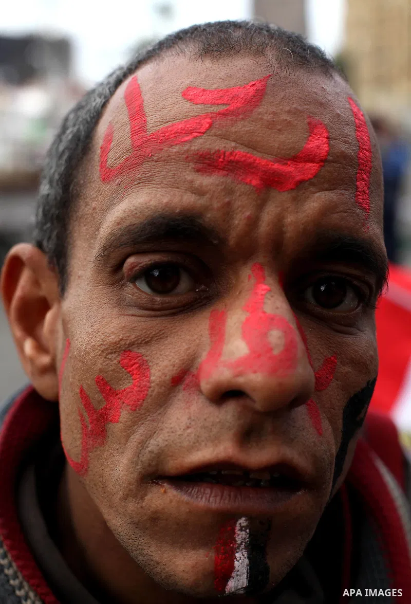 Egyptian protesters gather for a demonstration at Tahrir square in Cairo, Egypt, Friday, Dec. 21, 2012. Running clashes between rival protesters erupted in Egypt's second city Alexandria, on the eve of the final round of...