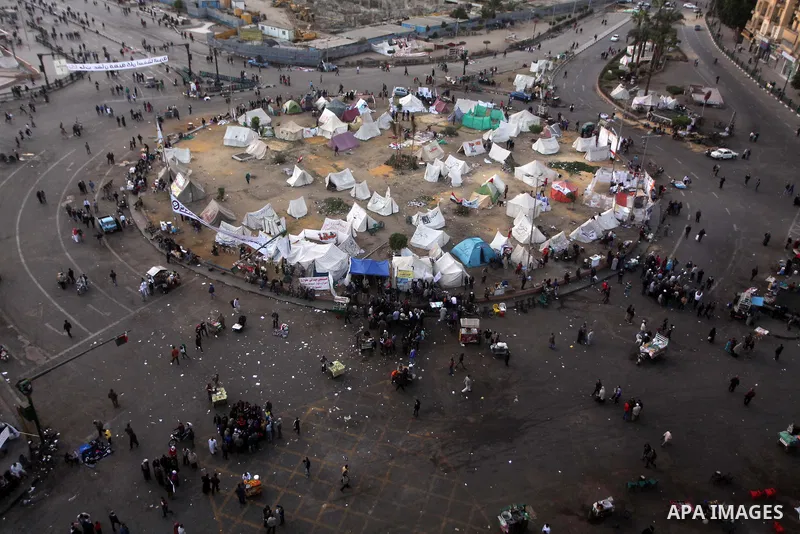 Egyptian protesters gather for a demonstration at Tahrir square in Cairo, Egypt, Friday, Dec. 21, 2012. Running clashes between rival protesters erupted in Egypt's second city Alexandria, on the eve of the final round of...