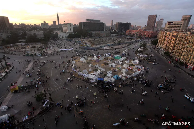 Egyptian protesters gather for a demonstration at Tahrir square in Cairo, Egypt, Friday, Dec. 21, 2012. Running clashes between rival protesters erupted in Egypt's second city Alexandria, on the eve of the final round of...