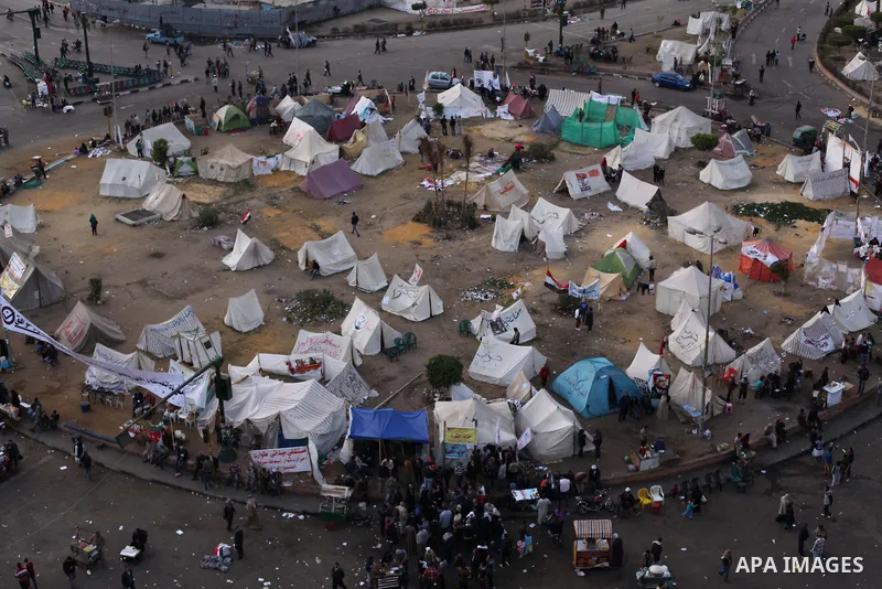 Egyptian protesters gather for a demonstration at Tahrir square in Cairo, Egypt, Friday, Dec. 21, 2012. Running clashes between rival protesters erupted in Egypt's second city Alexandria, on the eve of the final round of...