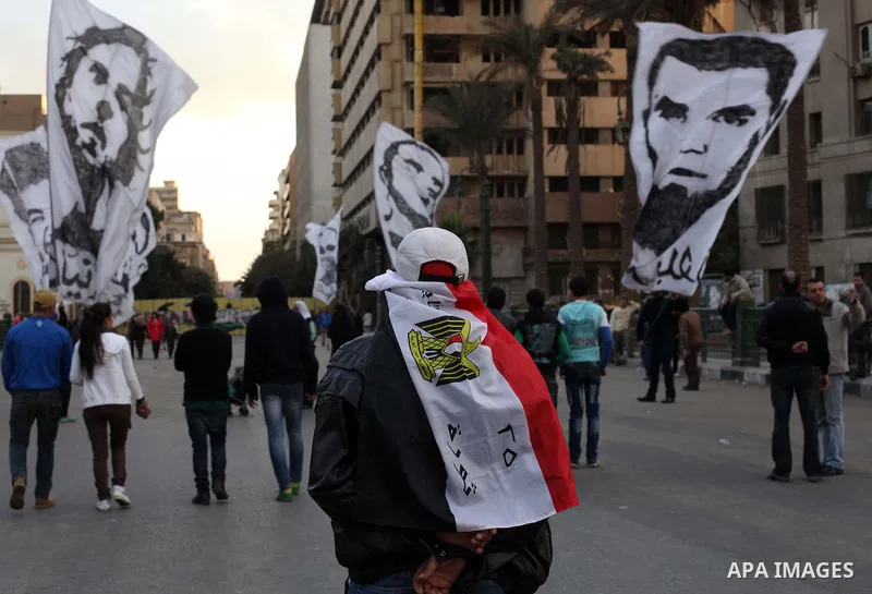 Egyptian protesters gather for a demonstration at Tahrir square in Cairo, Egypt, Friday, Dec. 21, 2012. Running clashes between rival protesters erupted in Egypt's second city Alexandria, on the eve of the final round of...