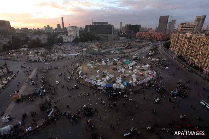 Egyptian protesters gather for a demonstration at Tahrir square in Cairo, Egypt, Friday, Dec. 21, 2012. Running clashes between rival protesters erupted in Egypt's second city Alexandria, on the eve of the final round of...