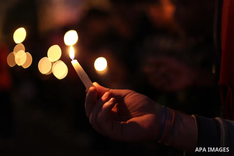 Egyptian protesters hold candles as they gather at Tahrir square in Cairo, Egypt, Friday, Dec. 21, 2012. Running clashes between rival protesters erupted in Egypt's second city Alexandria, on the eve of the final round o...