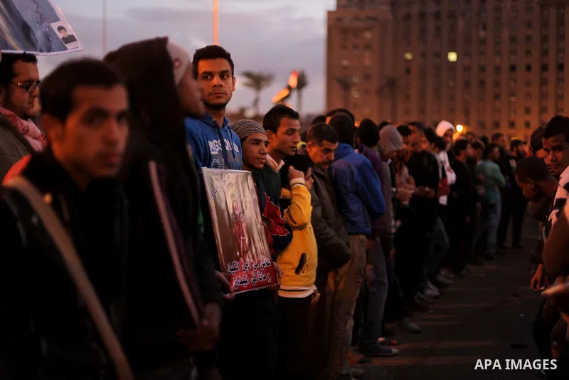 Egyptian protesters gather for a demonstration at Tahrir square in Cairo, Egypt, Friday, Dec. 21, 2012. Running clashes between rival protesters erupted in Egypt's second city Alexandria, on the eve of the final round of...