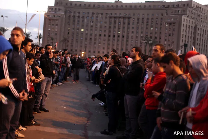 Egyptian protesters gather for a demonstration at Tahrir square in Cairo, Egypt, Friday, Dec. 21, 2012. Running clashes between rival protesters erupted in Egypt's second city Alexandria, on the eve of the final round of...