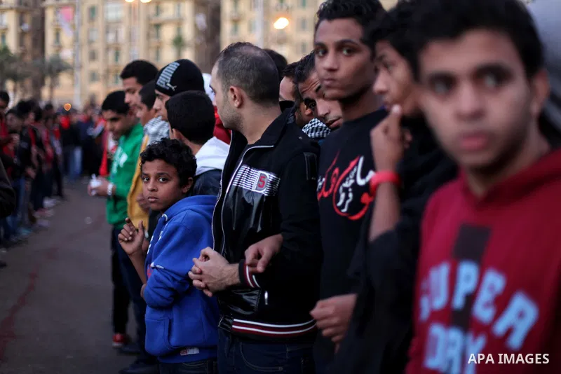 Egyptian protesters gather for a demonstration at Tahrir square in Cairo, Egypt, Friday, Dec. 21, 2012. Running clashes between rival protesters erupted in Egypt's second city Alexandria, on the eve of the final round of...
