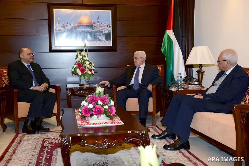 Palestinian President Mahmoud Abbas (Abu Mazen) meets with the Egyptian ambassador Yasser Othman, in the West Bank city of Ramallah, on Dec. 23, 2012. Photo by Thaer Ganaim