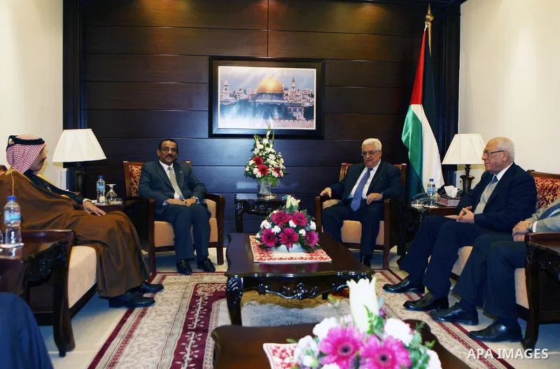 Palestinian President Mahmoud Abbas (Abu Mazen) meets with the Emirates ambassador and ambassador Qatar, in the West Bank city of Ramallah, on Dec. 23, 2012. Photo by Thaer Ganaim