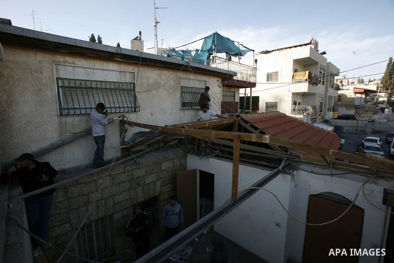 Palestinian youth demolish his house by himself In Wadi Joz in Jerusalem to avoid the high cost of paying for Israeli government bulldozers, or going to prison for not being able to pay, saying the buildings are construc...