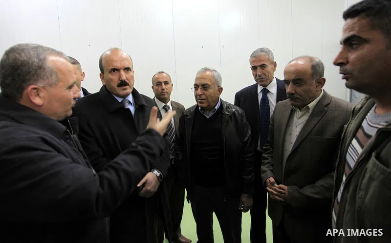 Palestinian Prime Minister Salam Fayyad, during the opening of the center filling vegetables Society's agricultural Burkin in the West Bank of Jenin, on December 23, 2012. Photo by Mustafa Abu Dayeh