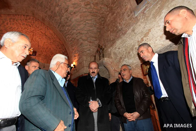 Palestinian Prime Minister Salam Fayyad, during the lighting of the Christmas tree in the church of Burkin in the West Bank of Jenin , on December 23, 2012. Photo by Mustafa Abu Dayeh