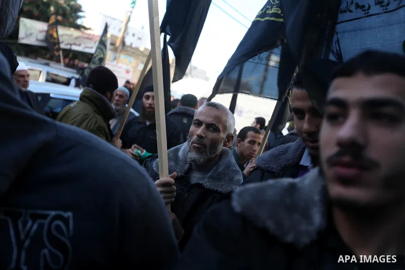 Palestinian members of National and Islamic movements speak during a rally in Gaza city on December 24, 2012. in solidarity with hunger-striking detainees held by Israel to demand their release from detention without tri...