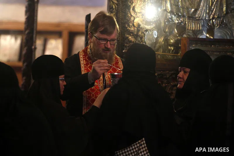 Greek Orthodox pilgrims visit the Church of the Nativity in the biblical West Bank city of Bethlehem, believed to be the birthplace of Jesus Christ, on December 24, 2012. Thousands of Palestinians and tourists were flock...