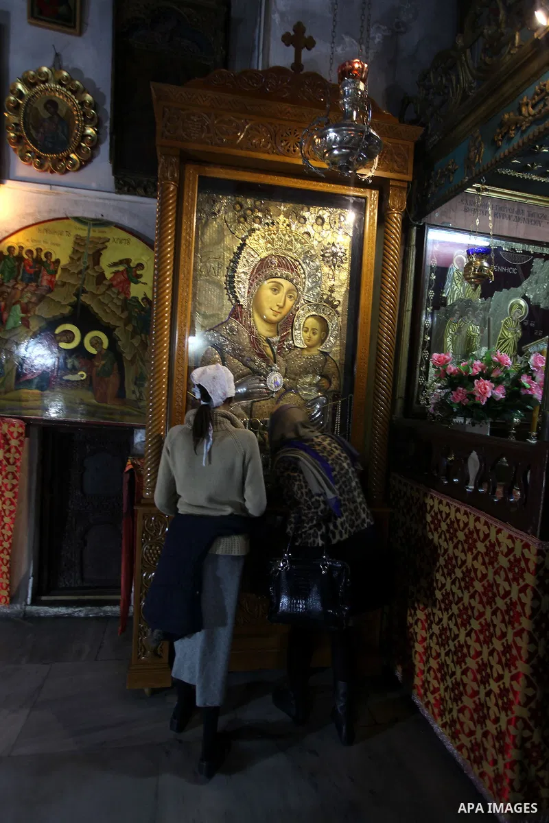 Greek Orthodox pilgrims visit the Church of the Nativity in the biblical West Bank city of Bethlehem, believed to be the birthplace of Jesus Christ, on December 24, 2012. Thousands of Palestinians and tourists were flock...