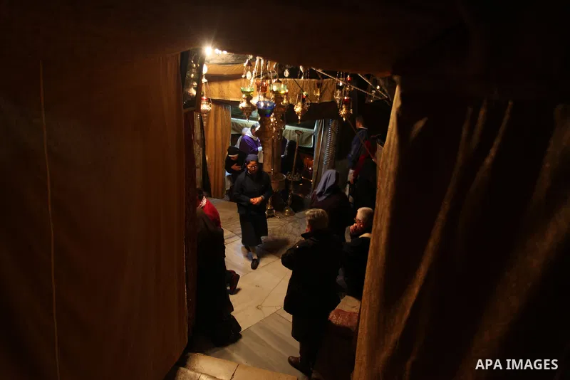Greek Orthodox pilgrims visit the Church of the Nativity in the biblical West Bank city of Bethlehem, believed to be the birthplace of Jesus Christ, on December 24, 2012. Thousands of Palestinians and tourists were flock...